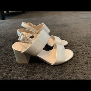 Soft gold Cole Haan Grand Zero sandals.